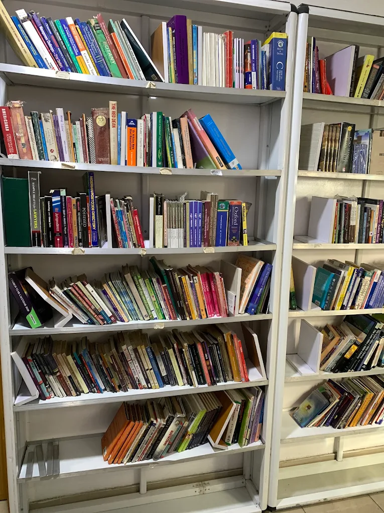 Books arranged on library shelves
