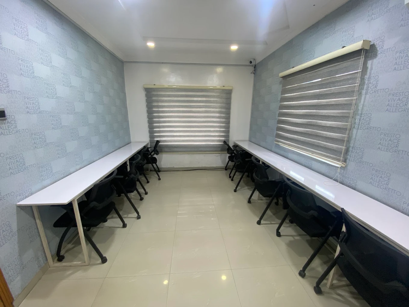 Training room arranged with desks and chairs